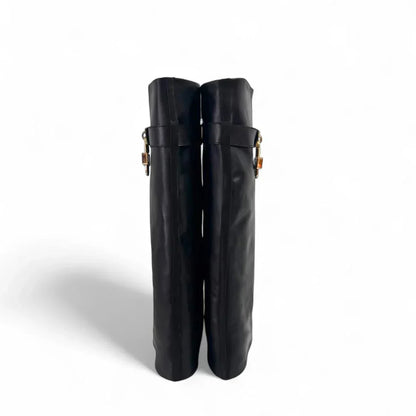 Leather boot with fold and gold charm